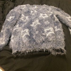 Blue sweater with silver stars