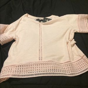 Pink t shirt with wholed edges