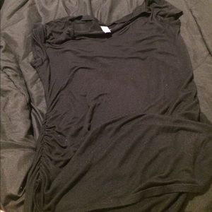 Long black shirt with ruffles on the sides