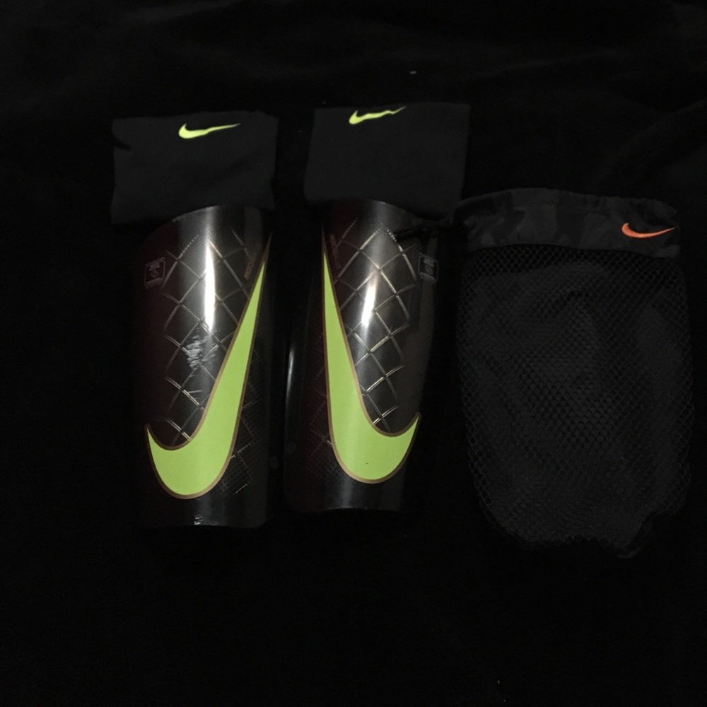 Mercurial/Lte soccer shin guards.