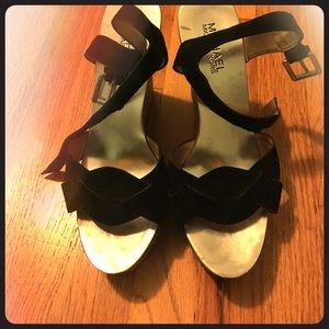 Black suede sandals with cork heels