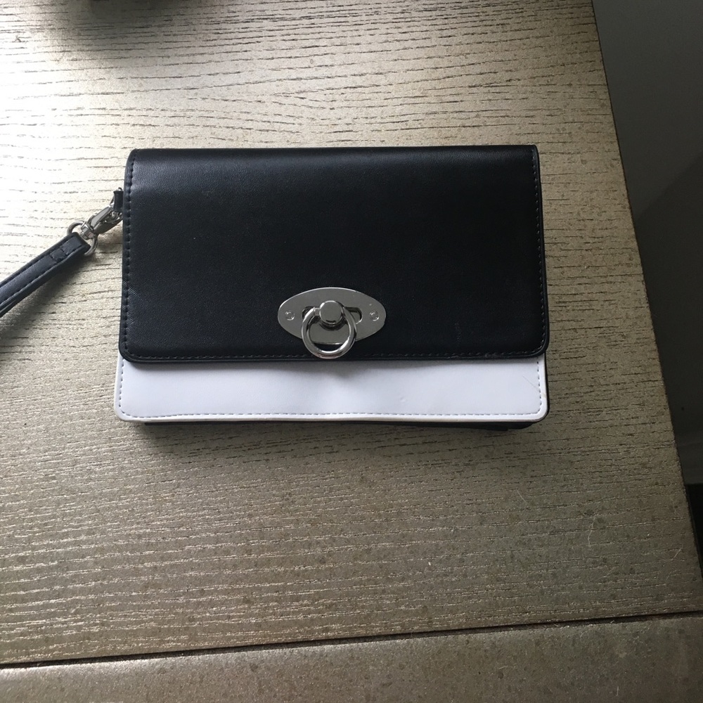 Brand new black and white leather wristlet