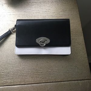 Brand new black and white leather wristlet