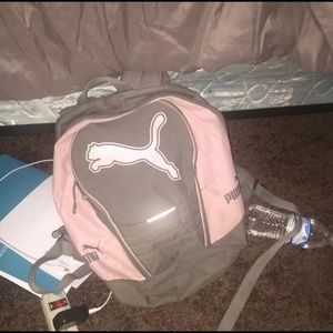 SELLING A PINK AND GREY PUMA BACKPACK