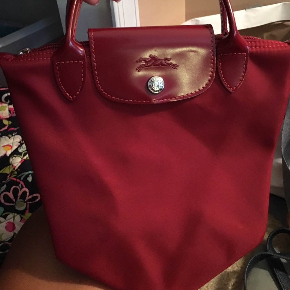 Longchamp red hand purse