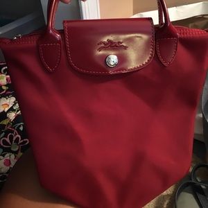 Longchamp red hand purse
