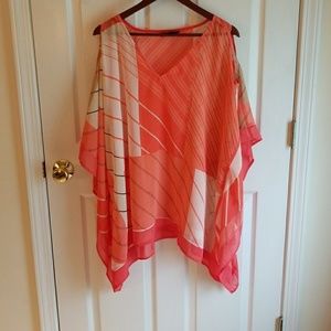Sheer cold shoulder poncho