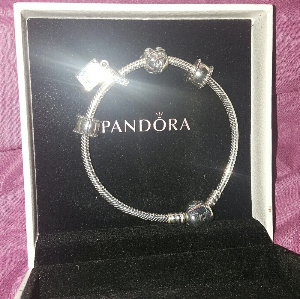 STERLING SILVER  PANDORA BRACELET W/ 4 CHARMS