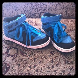 Nike SB Youth shoe. Size 12C.  Neon blue. Lace up.
