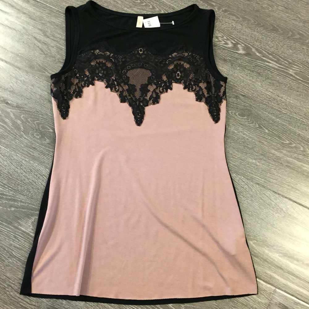 Brand new sleeveless top.