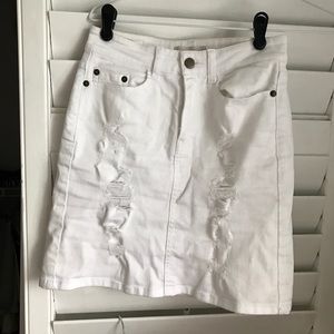 White, distressed denim skirt