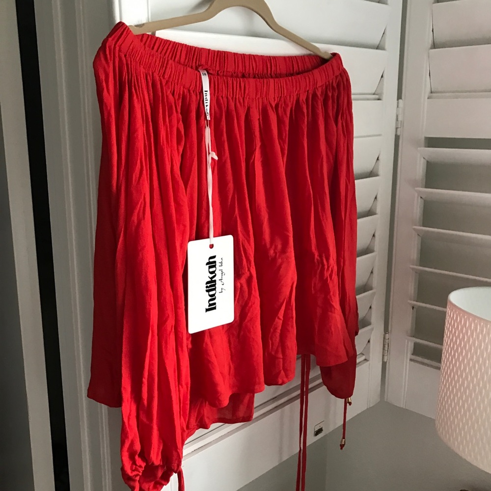 Red off-the-shoulder blouse