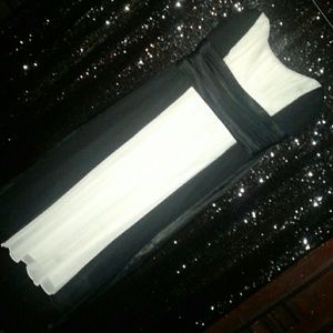 A beautiful black and white silk like evening gown