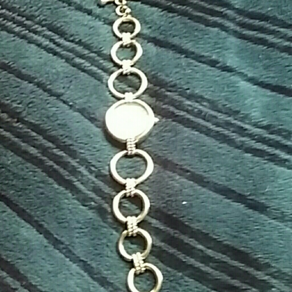 Silver bangle watch
