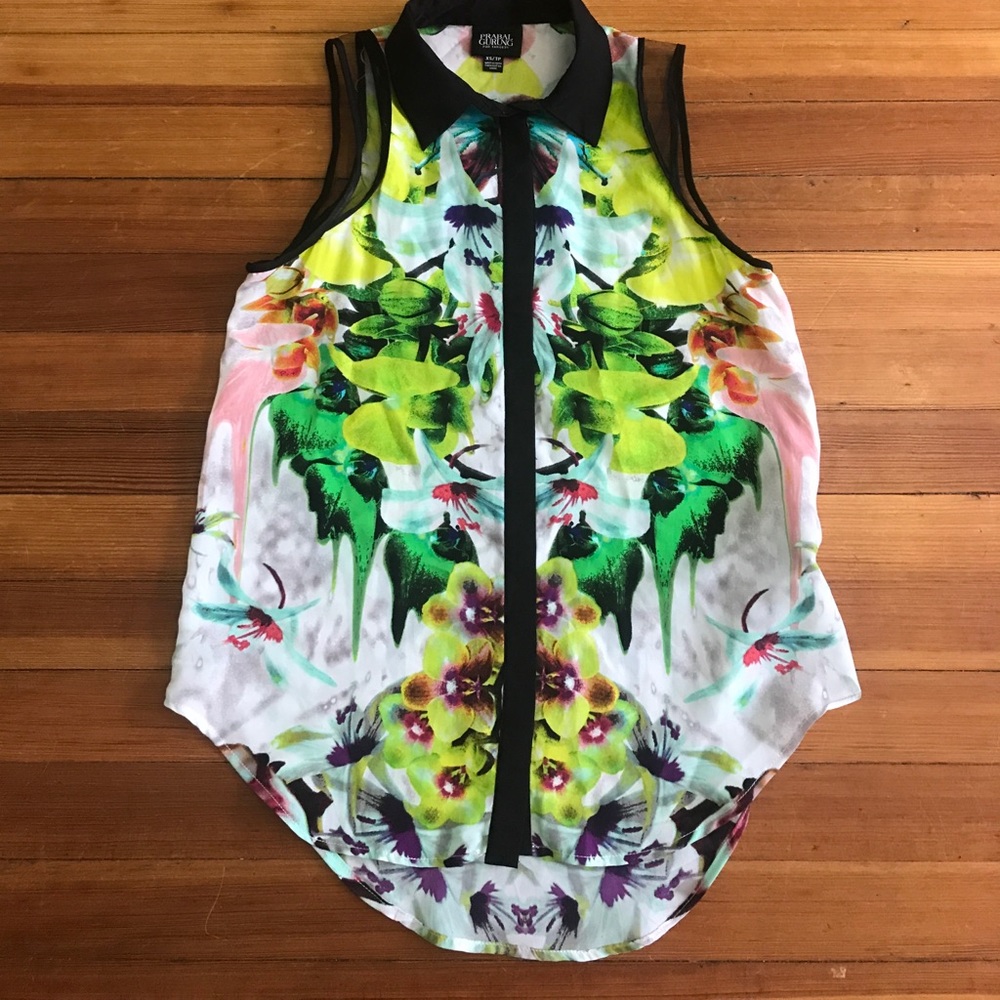 Colorful flower sleeveless collared shirt.