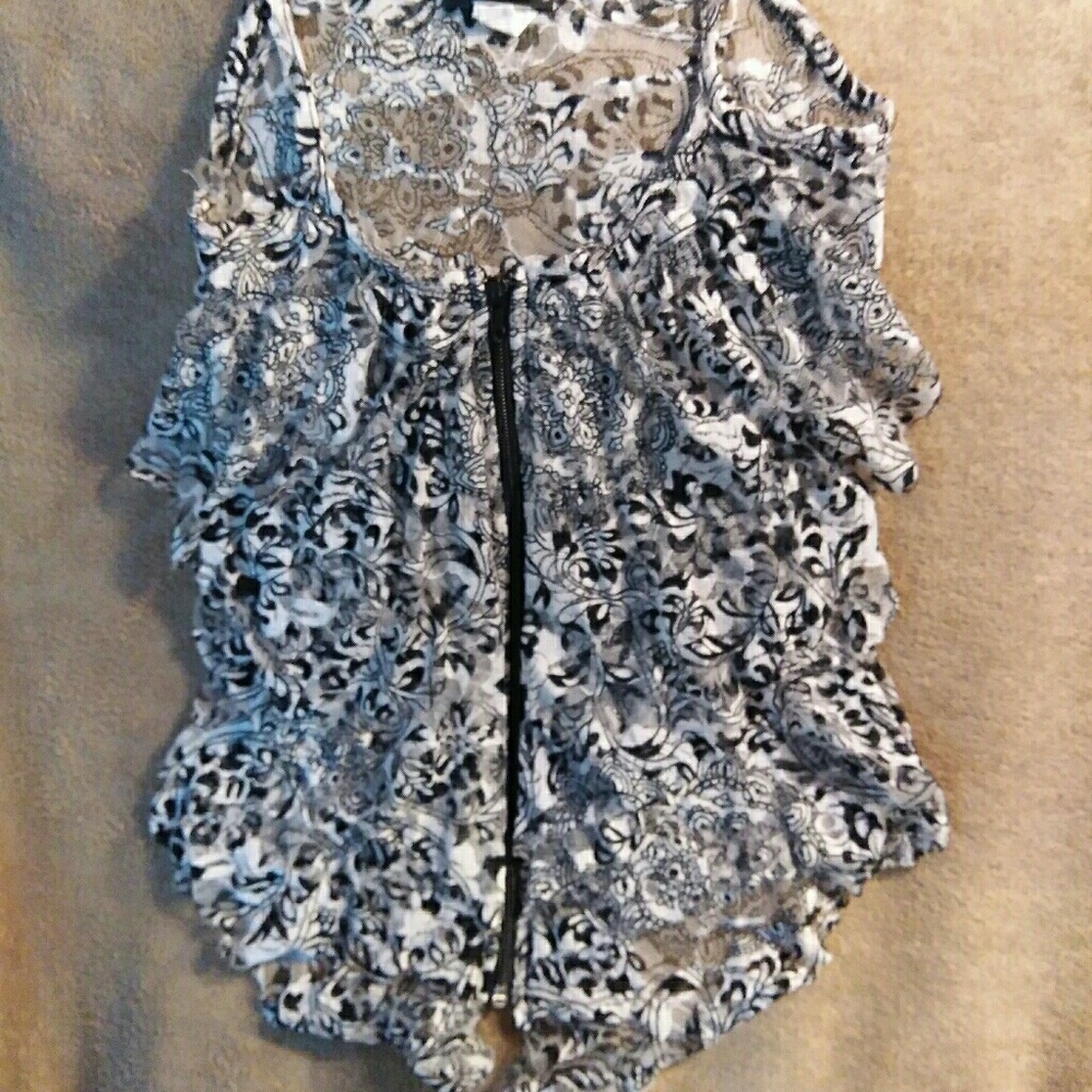 Floral print zip up tank top.