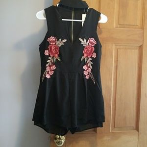 Black romper with flowers