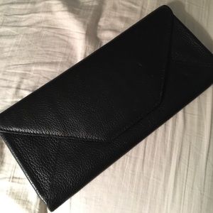 All leather black wallet/clutch by Neiman Marcus