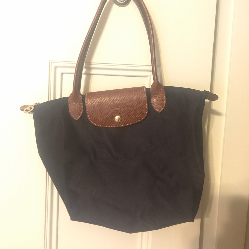 Mini Le Pliage Handbag from Longchamp.