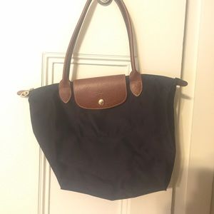 Mini Le Pliage Handbag from Longchamp.