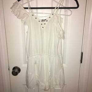 Selling an adorable white romper!