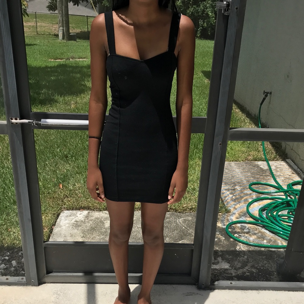 🔥Brand new. Black mini dress. Open back🔥