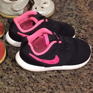 Nike pink and black shoes size 8