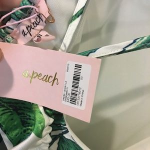 A. Peach Dresses - NWT A. Peach criss cross off shoulder palm dress A. Peach Dresses - NWT A. Peach criss cross off shoulder palm dress