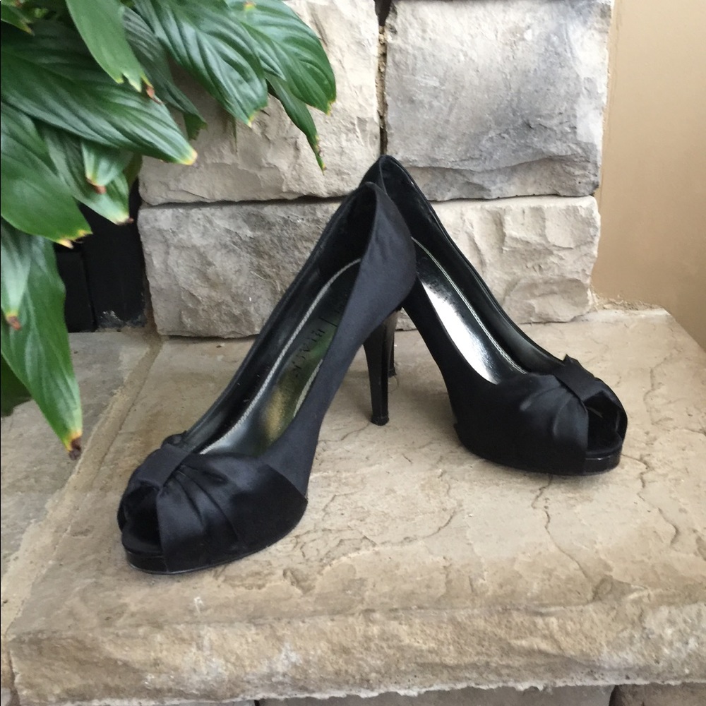 Dressy satin peep toe pump.