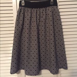 Black and creme patterned skirt