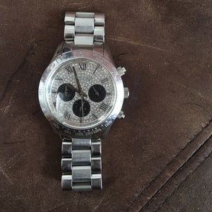 Silver Michael kors watch with crystal face