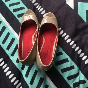 Nude wedge heels with peep toe