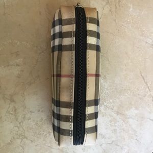 Burberry cosmetic bag.