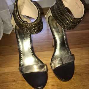 Bebe studded gold heels
