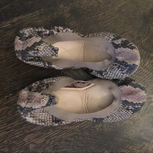 Brown reptile pattern flats.