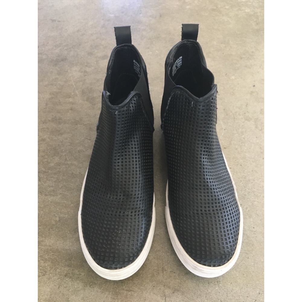 Black perforated leather Steve Madden high top 8.5
