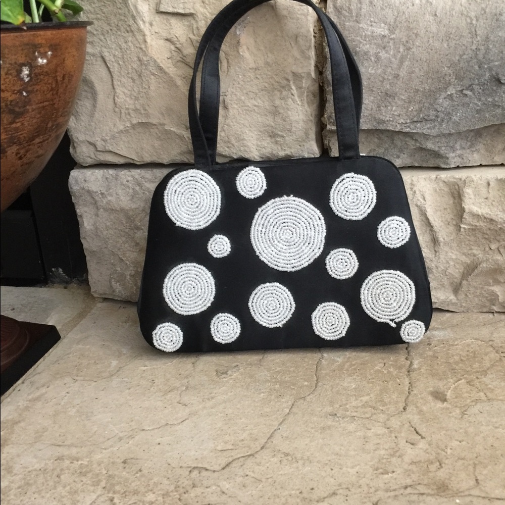 Evening bag. Black satin with beading detail.