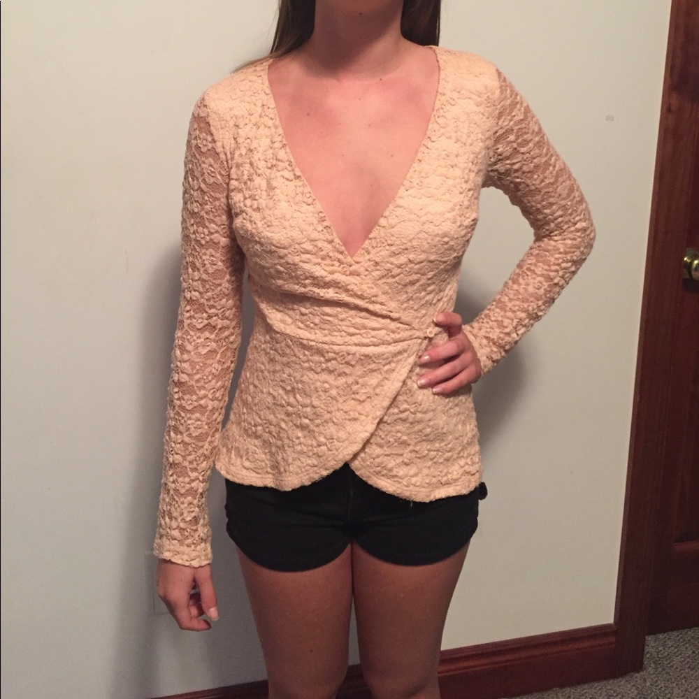Lace long sleeve peplum wrap top