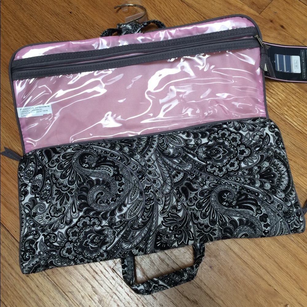 Hanging flat iron/makeup organizer.