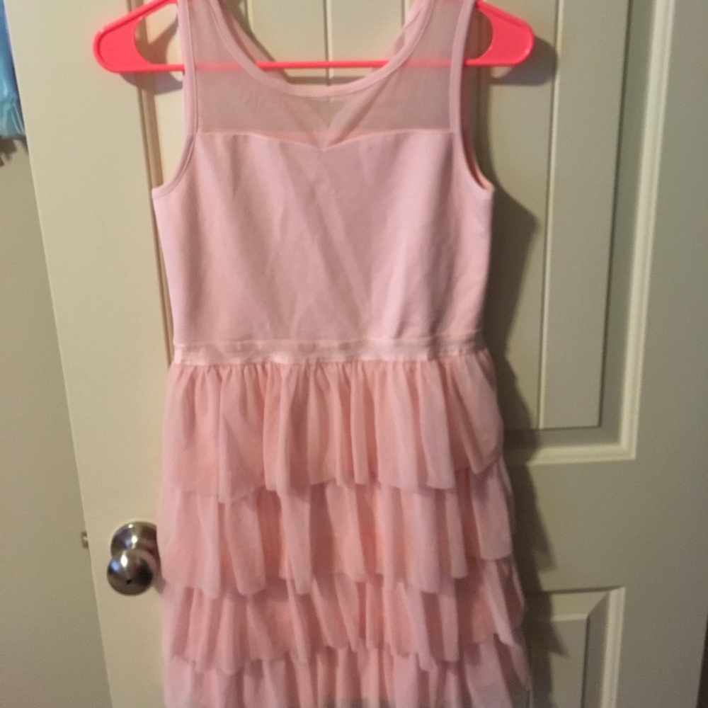 girls pink ruffled dress.