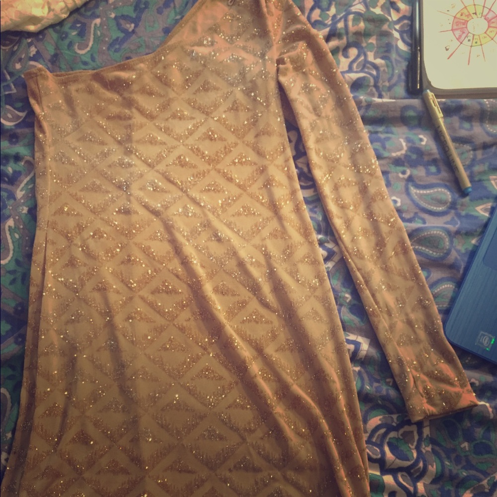 Off-the shoulder gold glitter homecoming dress.