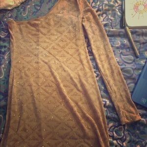 Off-the shoulder gold glitter homecoming dress.