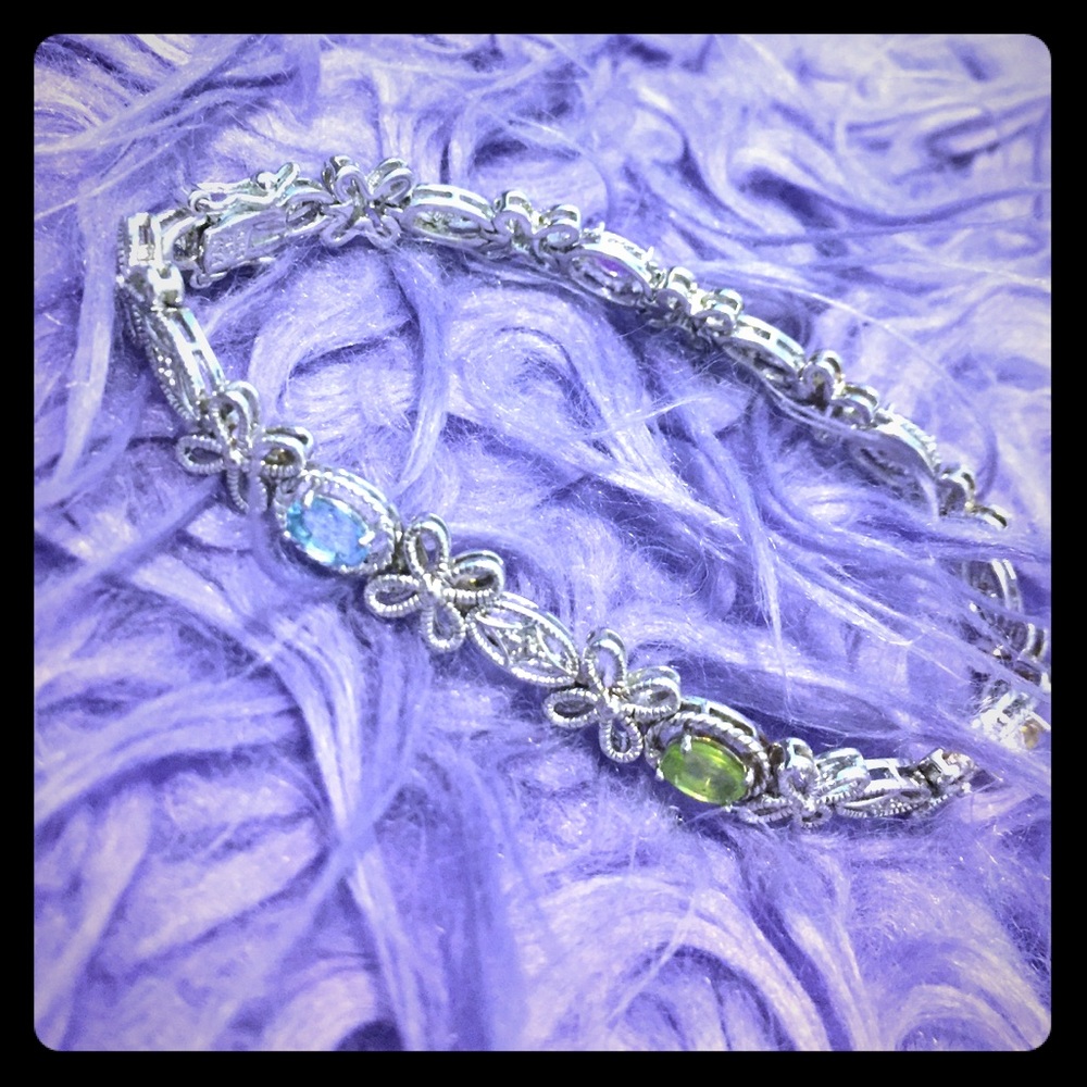 Silver floral bracelet with multicolored gemstones