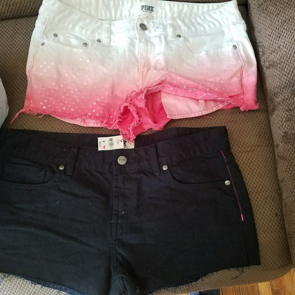 2 pink brand shorts. Black still have tags on them