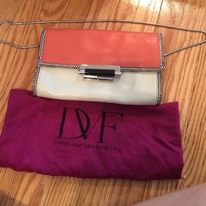 DVS coral/cream/snake skin Clutch
