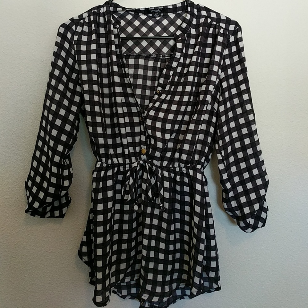 Black and white checkered blouse