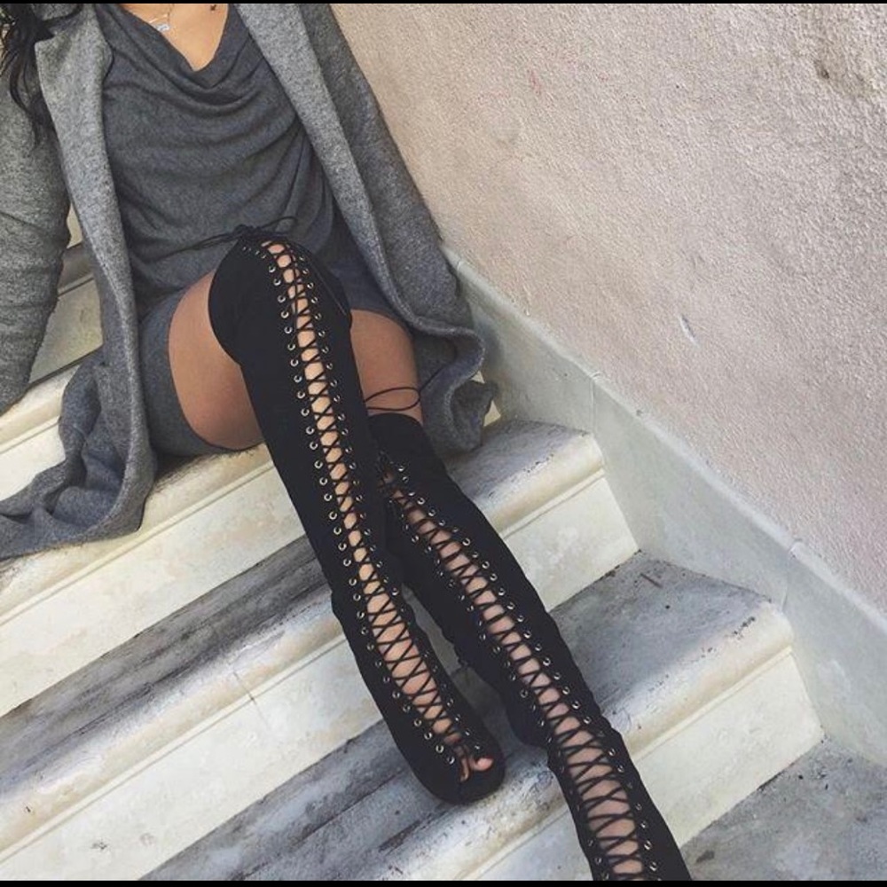 Knee high lacy up boots