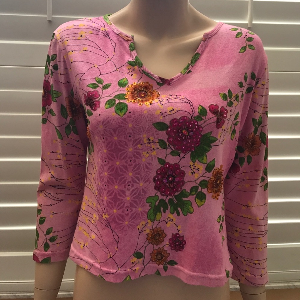 A Pretty Pink Floral Design Chaudry Sports Top.