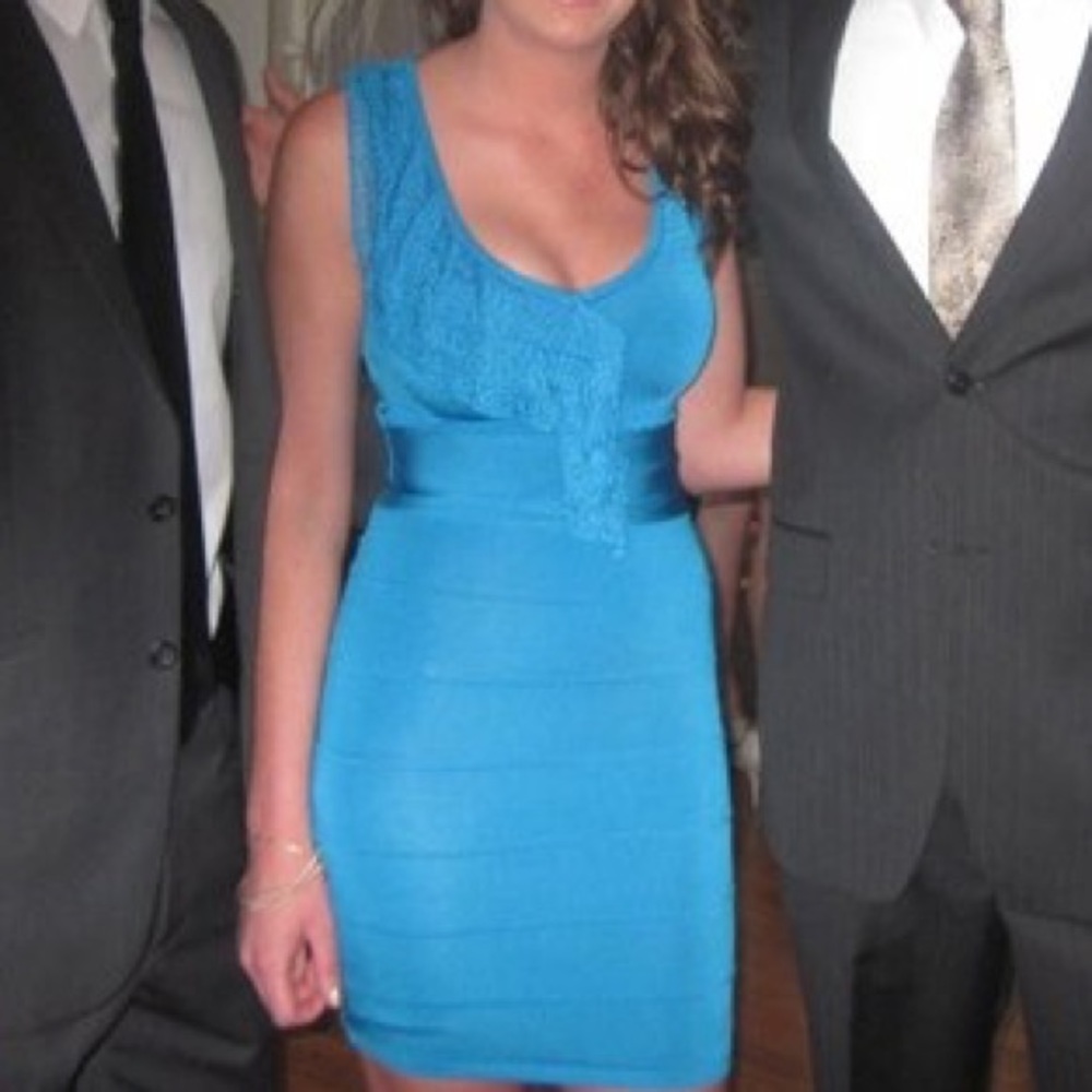 Bebe blue bandage dress with ruffle. Size Small.