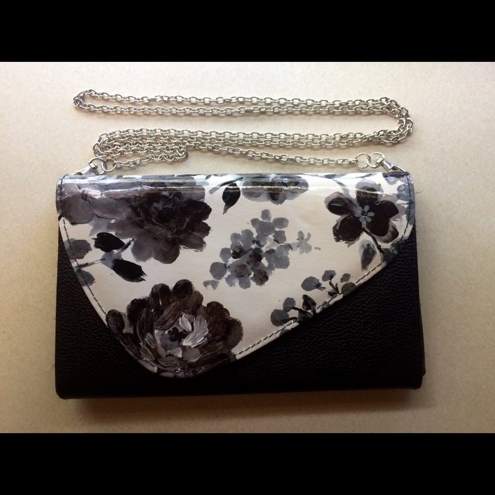 Black and white clutch or shoulder bag.